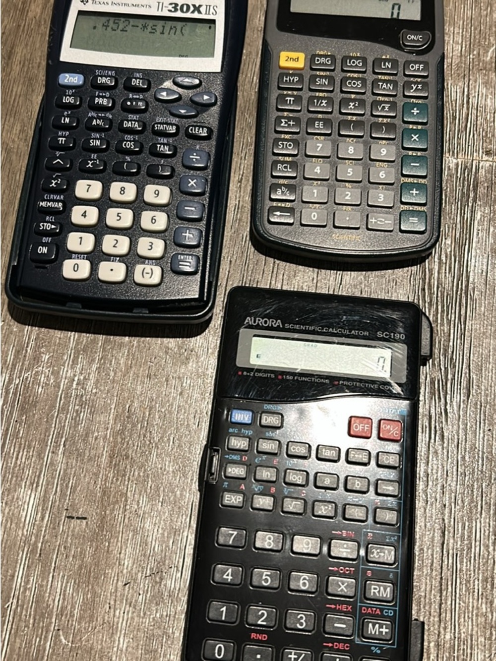Set of Three Scientific Calculators - Black and Gray